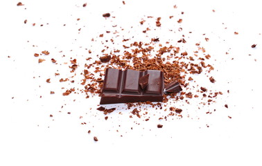 Pile chopped, milled chocolate with shavings isolated on white