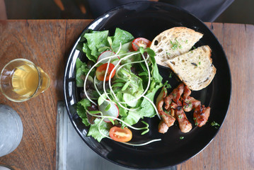 fried pork salad or fried pork with bread and vegetable