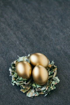 Three golden Easter eggs