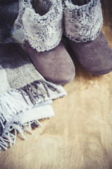 Warm home clothes. Woolen plaid and home slippers.