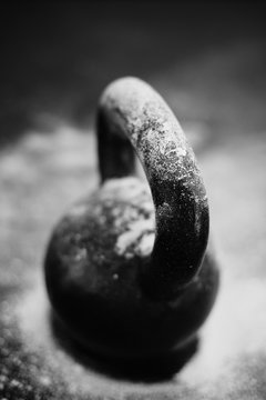 Close up of a kettle weight with chalk