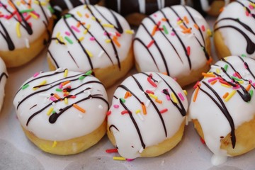 A lot of donut and strawberry jam