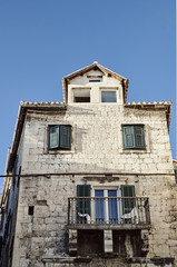 Stone house with balcony in the city of Split in Croatia.