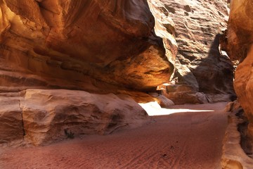 Rocks in red and orange colors. Path walking to the Treasury, Petra, Jordan