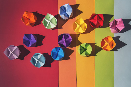 Rainbow fortune tellers on multi-coloured background...