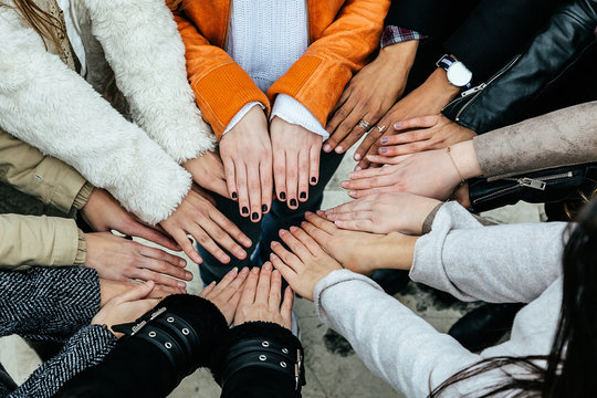 Friends Stacking Hands