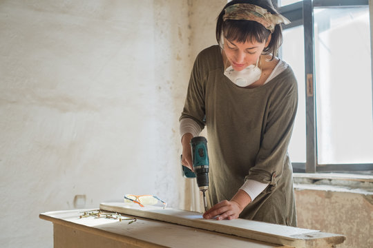 Woman renovates her apartment