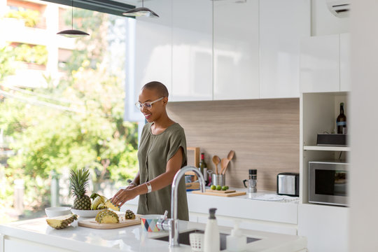 Beautiful black woman preparing healthy snacks