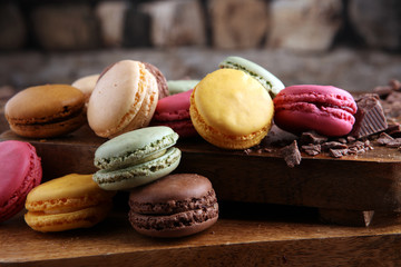 Close up colorful macarons dessert with vintage pastel tones