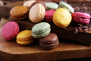 Close up colorful macarons dessert with vintage pastel tones