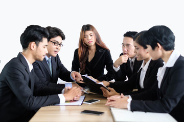 Asian business people meeting time,manager listening his staff brainstorming discussing about new startup project together in conference room at office,business colleagues teamwork concept.