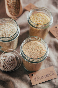 Quinoa, amaranth, bulgur and buckwheat in jars