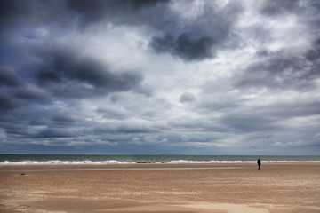 Solitary figure at Harve Aubert beach