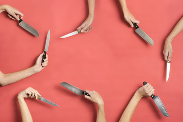 Composition with knifes and hands