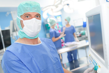 portrait of surgeon standing in operation room at the hospital