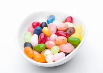 Jelly beans sweet colorful candies in white bowl