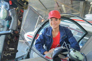 engineer maintaining a helicopter engine © auremar