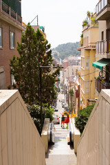 Narrow street in Barcelona, the capital city of the autonomous community of Catalonia in the Kingdom of Spain