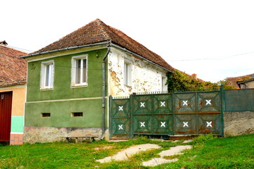 Typical rural landscape and peasant houses in Barcut, Bekokten, Brekolten, Transylvania, Romania....