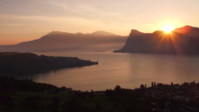 Sunrise over lake Lucerne at an autumn morning with Mount Rigi in the background