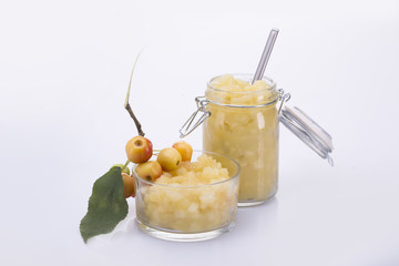 jam of apples and small apples on a white background.