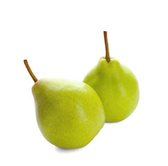 Delicious ripe pears on white background