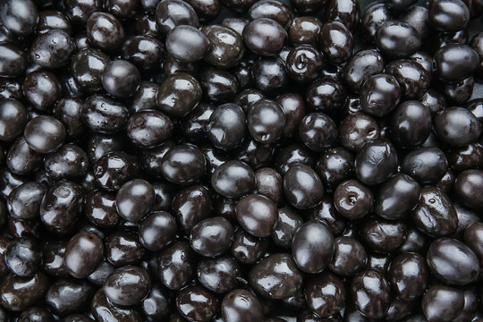 Canned black olives as background
