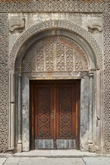 Church door in monastery Geghard in Armenia  