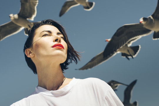 Portrait of a woman with seagulls