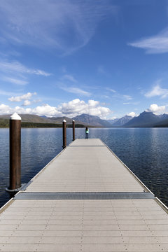 Woman on Lake McDonald Pier in Glacier National Park