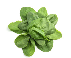 Fresh spinach leaves on white background