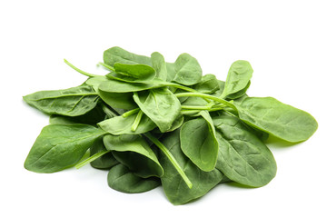 Fresh spinach leaves on white background