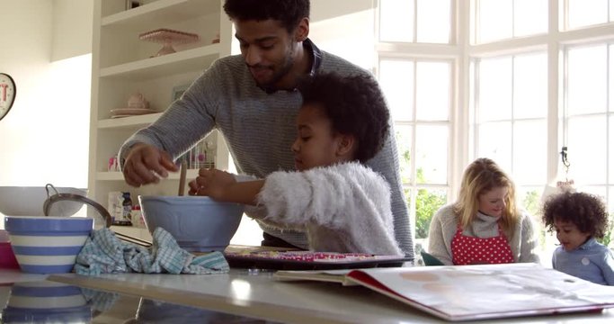 Family Baking Cake At Home Shot On R3D