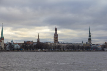 Panorama view of Riga, Latvia  and its churches in early spring with overcast sky
