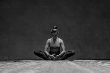 Young beautiful yoga female posing in studio - 173122444