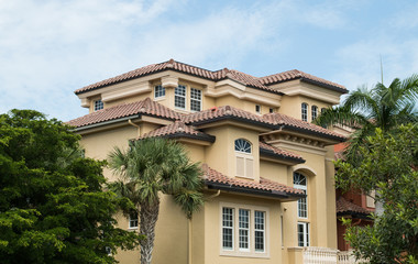 Fototapeta na wymiar Typical South Florida modern villa house architecture in Spanish style 