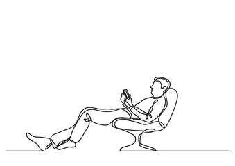 continuous line drawing of man relaxing in chair with his mobile phone