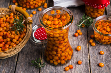 Berries of sea buckthorn with syrup