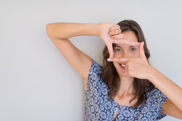 woman showing framing hand gesture