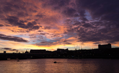 Fototapeta na wymiar Sunset on the River Thames in London England.
