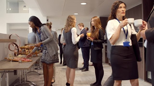 Delegates At Lunch Buffet During Conference Break