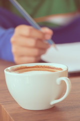 coffee with hand writing