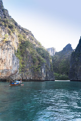 a long tail boat floating in phiphi island,Thailand 