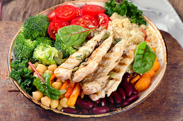 Healthy vegetables bowl with grilled chicken