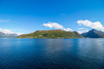 Obraz premium The village of Oksfjord in beautiful environments in Northern Norway. Oksfjord is the administrative centre of the municipality of Loppa in Finnmark county, Norway.