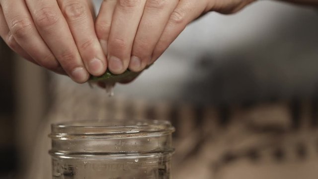 Slow Motion, Chef Squeezes Juice Out Of Lime