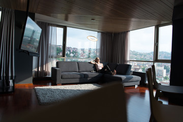 woman using tablet in beautiful apartment