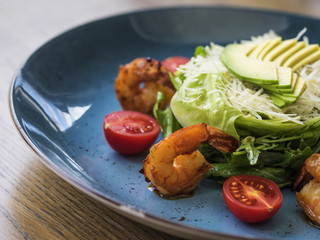 Salad with tiger shrimps