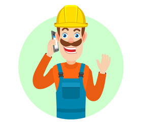 Builder talking on mobile phone and raised a hand in greeting