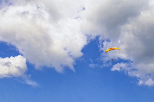 Skydiver in the clouds